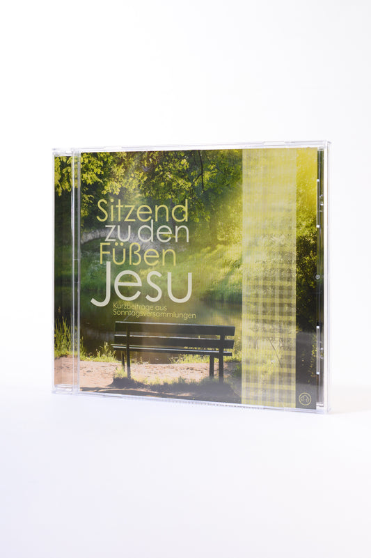 Sitzend zu den Füßen Jesu